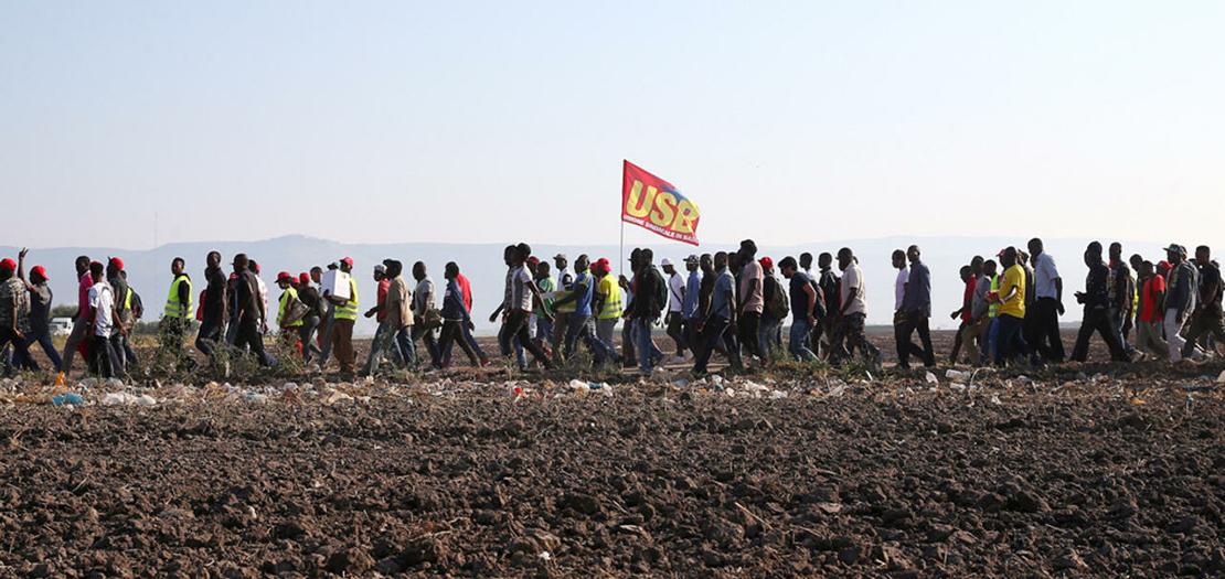 مسيرة احتجاجية للعمال الأفارقة في إيطاليا بعد وفاة 16 من زملائهم سنة 2008